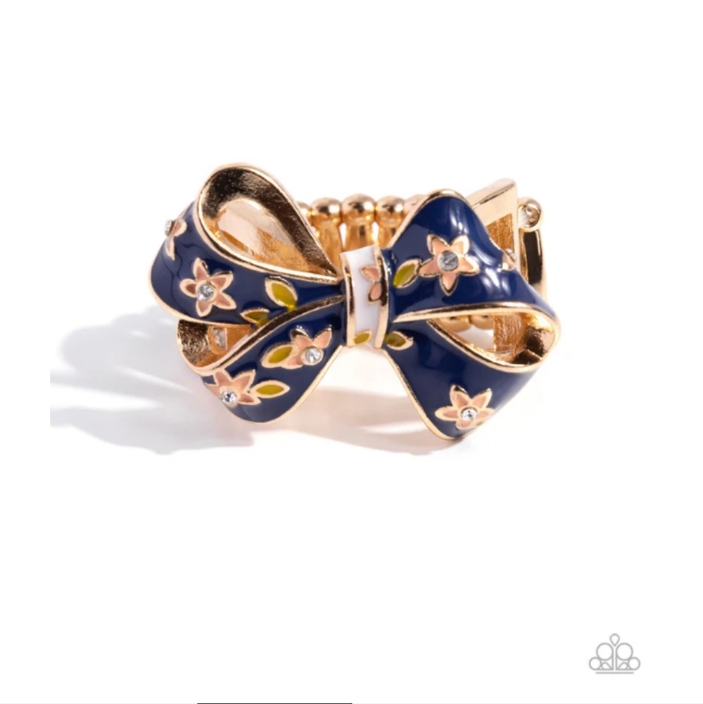 Bow Caution To The Wind Gold Ring Unique Chucky Fashion Jewelry Paparazzi